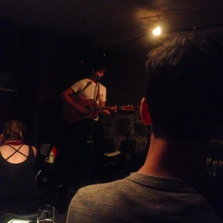 Poet, singer/songwriter, playwrite and overall good guy Andre Simoneau at the mic.