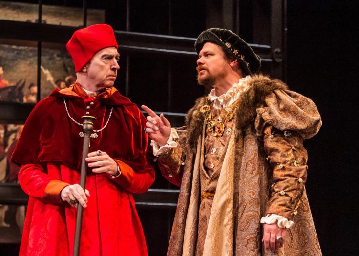 King Henry (right, David Foubert) consults with his trusted advisor, Cardinal Wolsey (Philip Goodwin). Photo: © Jerry Dalia,  The Shakespeare Theatre of New Jersey